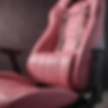 Close-up of ergonomic design features on a pink gaming chair