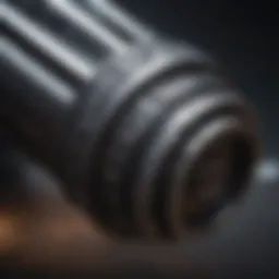 Detailed close-up of a lightsaber hilt showcasing intricate design elements