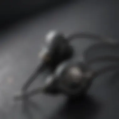 Close-up of gaming earbuds showcasing mic features