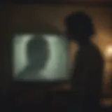 Silhouetted TV screen with zombie shadow